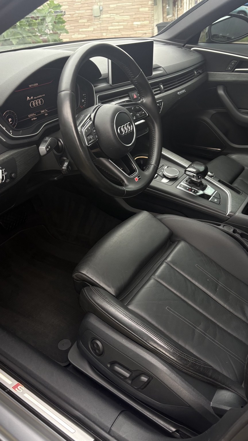 Audi driver seat and floor after detailing